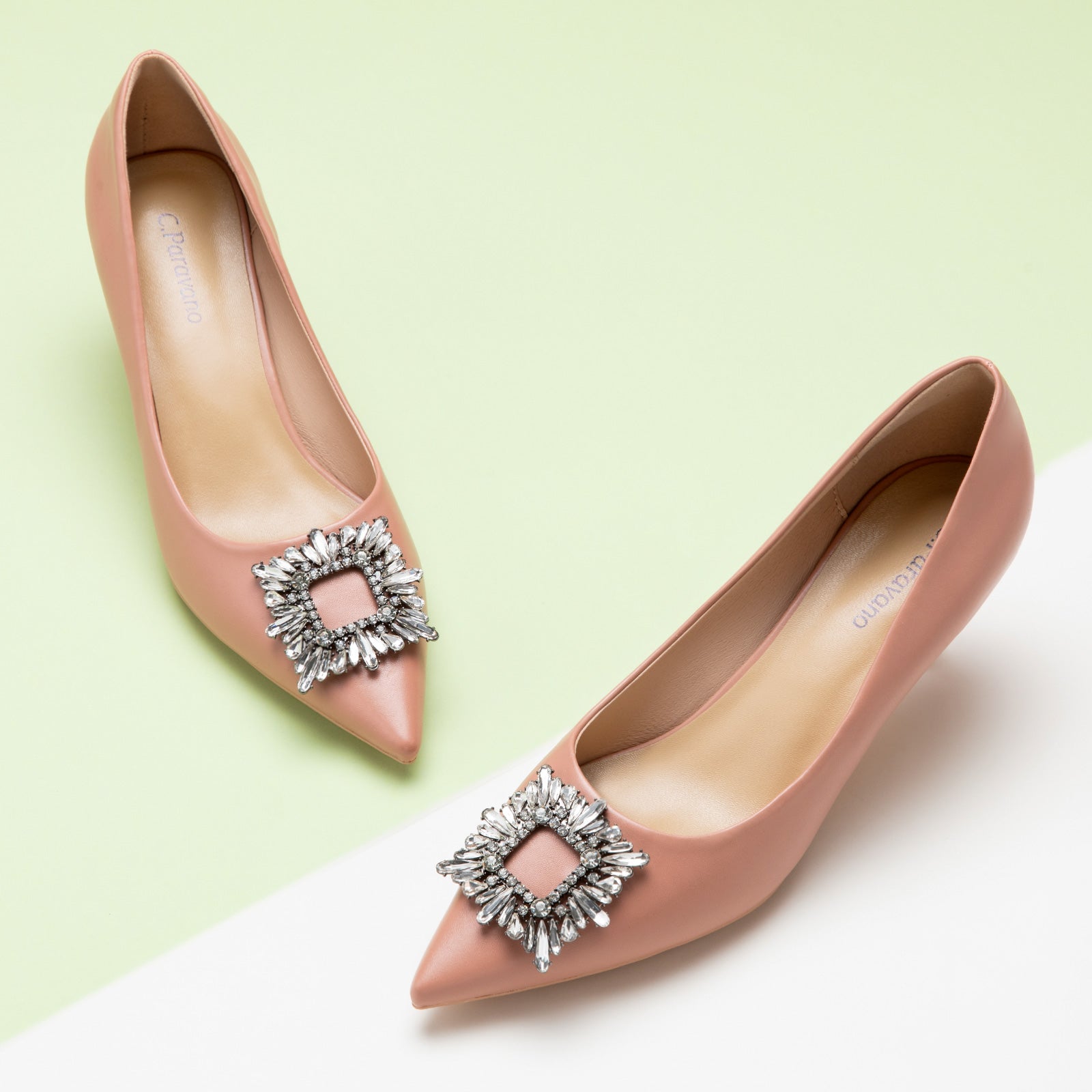 Pretty pink pumps with sparkling crystal embellishments and a charming buckle detail – a perfect blend of femininity and comfort.